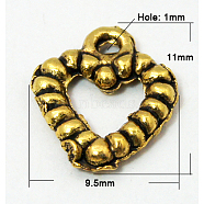 Tibetan Style Charms, Lead Free and Cadmium Free, Heart, Antique Golden, about 9.5mm wide, 11mm long, hole: 1mm(GAC0324)
