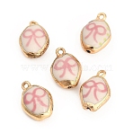 Printed Handmade Porcelain with Brass Pendants, Oval with Bowknot Charms, Golden, Pink, 18.5~19.5x13~13.5x8~8.5mm, Hole: 1.8mm(PR-CBAB520-13G)