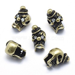 Brass Beads, with Clear Cubic Zirconia, Cadmium Free & Nickel Free & Lead Free, Skull, Antique Golden, 14x8.5x10.5mm, Hole: 2mm(KK-J279-53AG-NR)